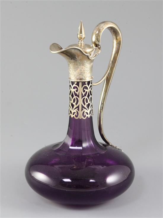 A Victorian silver mounted amethyst glass claret jug and stopper by Charles Reily & George Storer, London, 1839, 25cm.